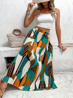A Half-Length Skirt with a Geometric Print Designed to Attract Wealth, Featuring Pleats And a Flared Shape - Mixed colors