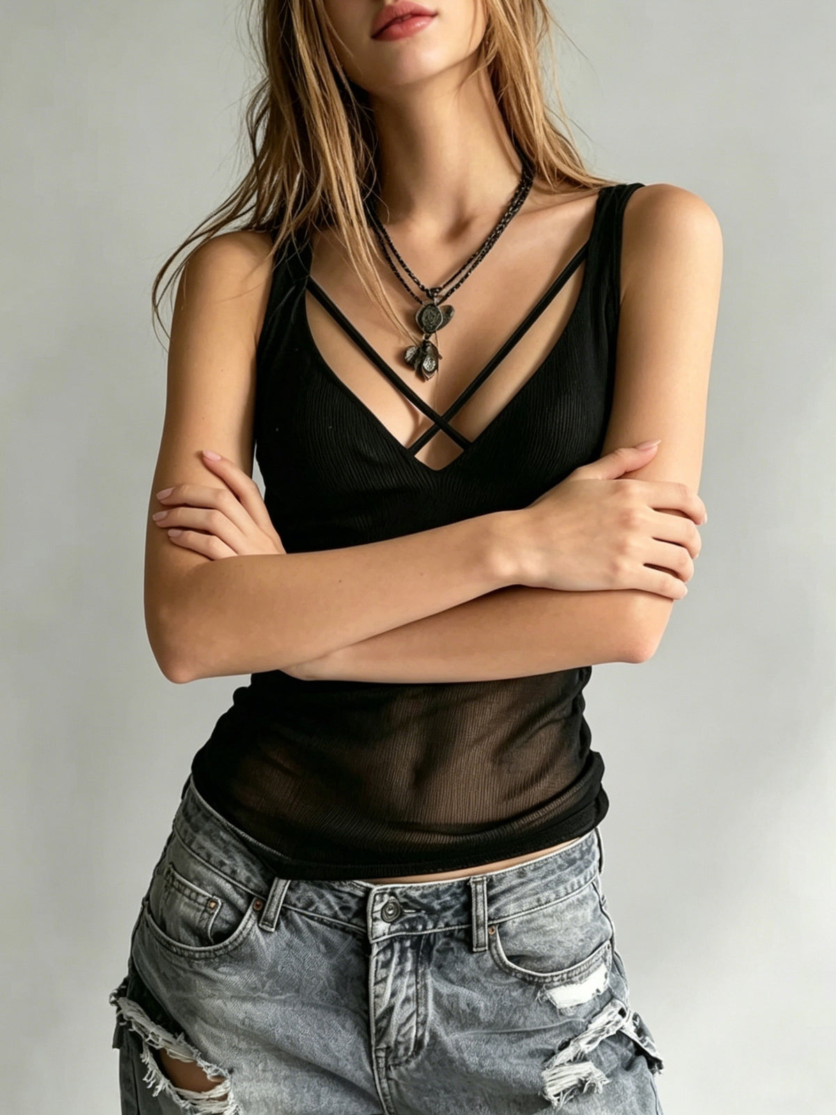 Spring/Summer Solid Color Sheer Mesh Vest with Designer Cross-Strap Front, Inner Layering Top, and Versatile Base Layer. Women's Summer Solid Color Semi-Sheer Mesh Designer Slim-Fit Base Layer. A Sleeveless Top for Daily Streetwear, Casual Inner - Black