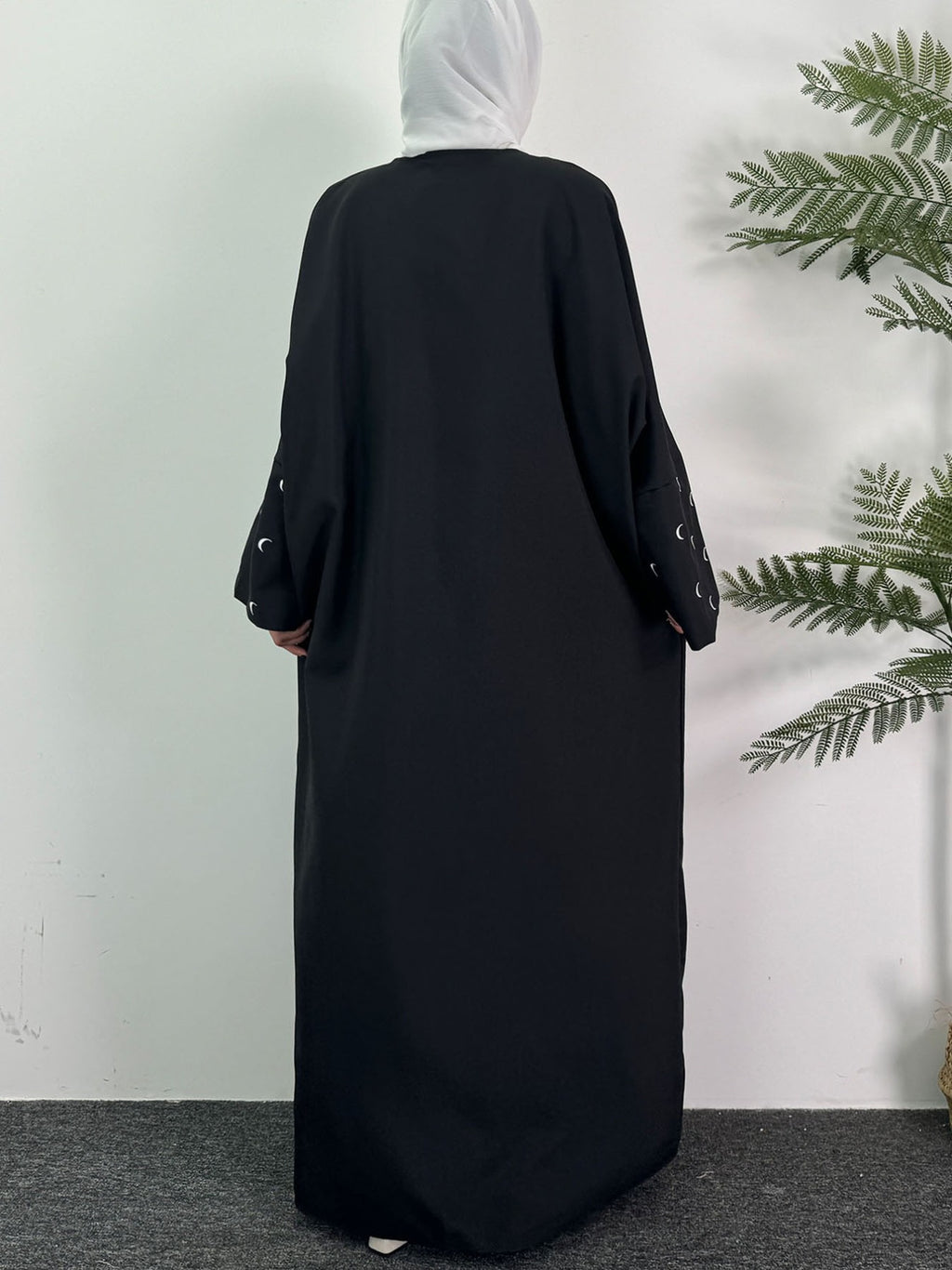 Traditional Middle Eastern Attire, The UAE Abayas, Features Moon Embroidery And Kaftan Styles with Long Sleeves, Ideal for Casual Wear in Spring And Autumn, Made from Fabric - Black