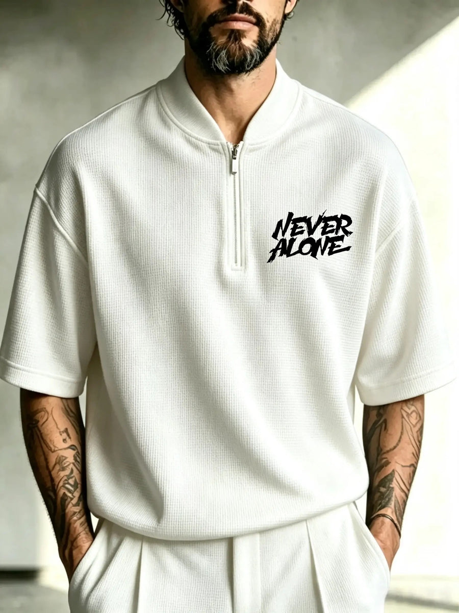 Men's Waffle Knit Half-Zip Polo Shirt with Punk Graffiti "NEVER ALONE" Print - Stand Collar Short Sleeve T-Shirt Suitable for Spring/Autumn, Loose Fit Streetwear, Machine Washable Urban Fashion Top - White