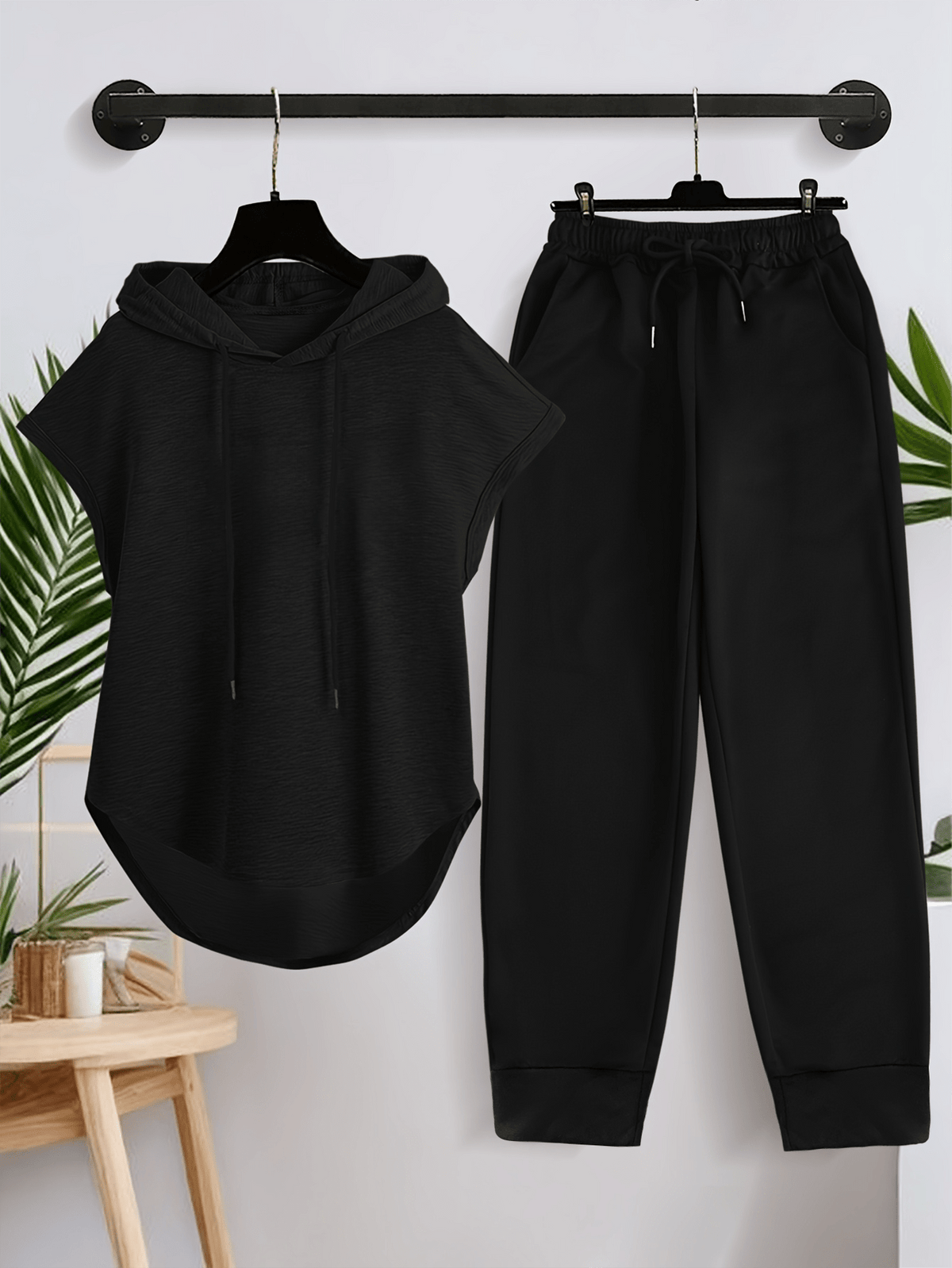 A Must-have New Product! Solid Color Sleeveless Hooded S Set! Jogger Pants with a Cinched Waist Highlight the Waistline, Paired with Sneakers for a Casual and Energetic Look, Women's Spring and Summer Fashion Casual Hooded Short-sleeve Set. - Black