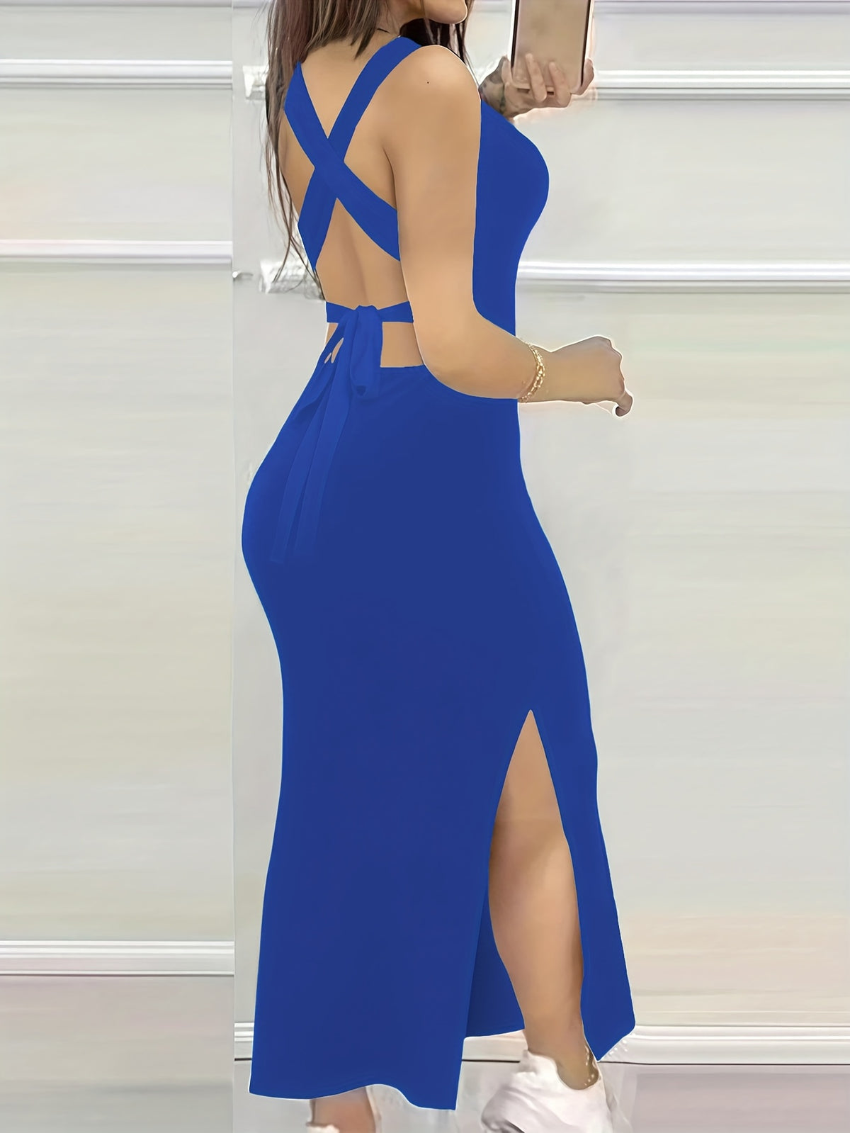 Essential for a -Like Vacation: a Summer Elegant Solid Color Backless Dress with a Crisscross Strap Design That Highlights a Charming Back, Showcasing a Lazy Yet Sexy Allure - Blue