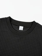 Men'S Waffle Knit T-Shirt, a Short Sleeve Crew Neck Casual Summer Top Featuring Premium Handcrafted Fashion Labeling. Made from Textured, Breathable Fabric with a Soft And Lightweight Feel, Offering a Comfortable Slim-Fit Design - Black