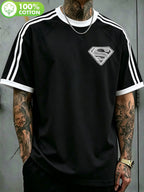 WB Warner Bros. Authentic New Men's Raglan Double-Stripe 100% Pure Cotton T-Shirt, Featuring a Hand-Drawn Draft-Style Superman Core Emblem Print with Distressed Thread Design. A Versatile Casual Cotton Tee for Men, Suitable for Daily Wear and Outdoor - Black