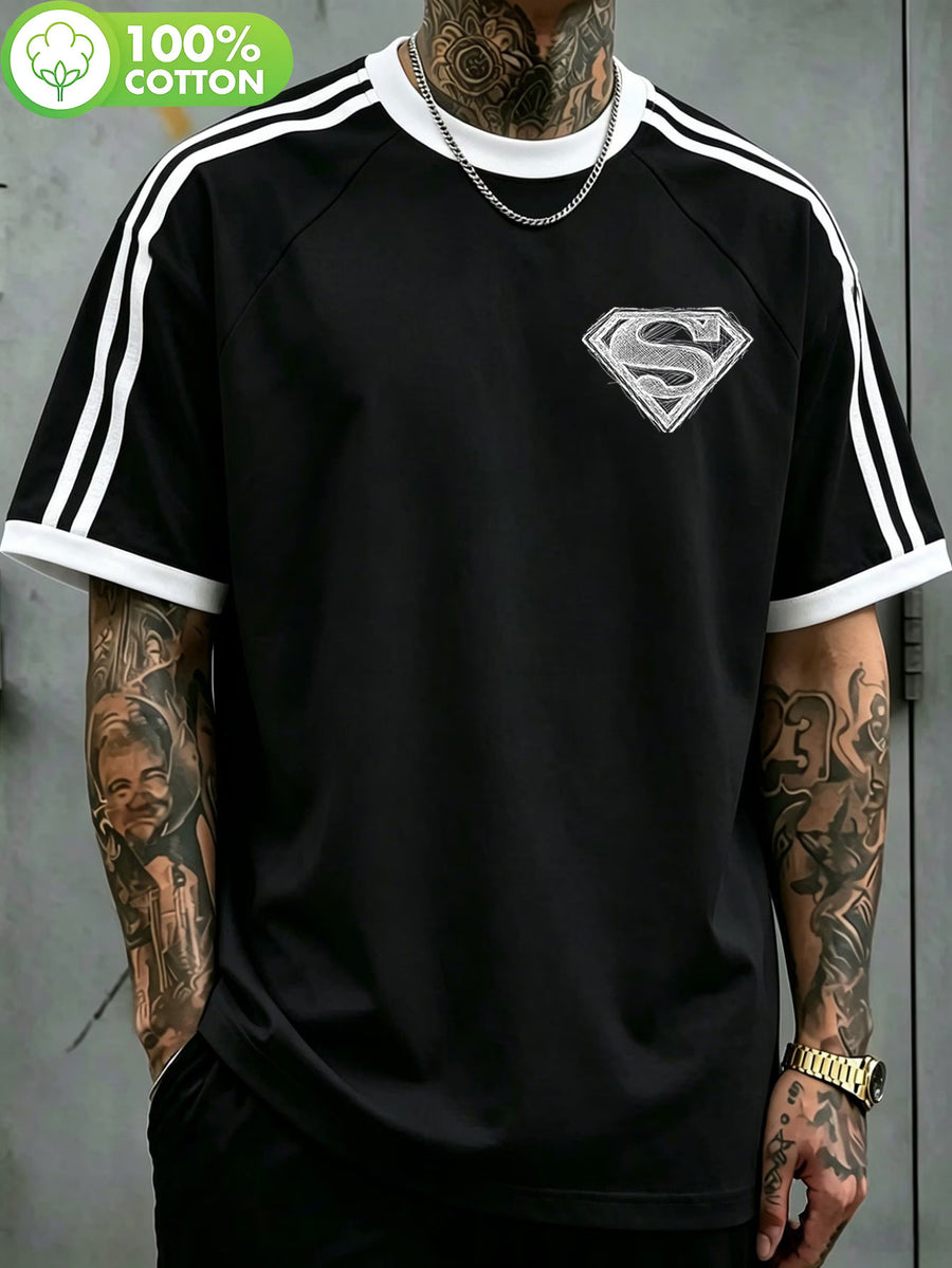 WB Warner Bros. Authentic New Men's Raglan Double-Stripe 100% Pure Cotton T-Shirt, Featuring a Hand-Drawn Draft-Style Superman Core Emblem Print with Distressed Thread Design. A Versatile Casual Cotton Tee for Men, Suitable for Daily Wear and Outdoor - Black