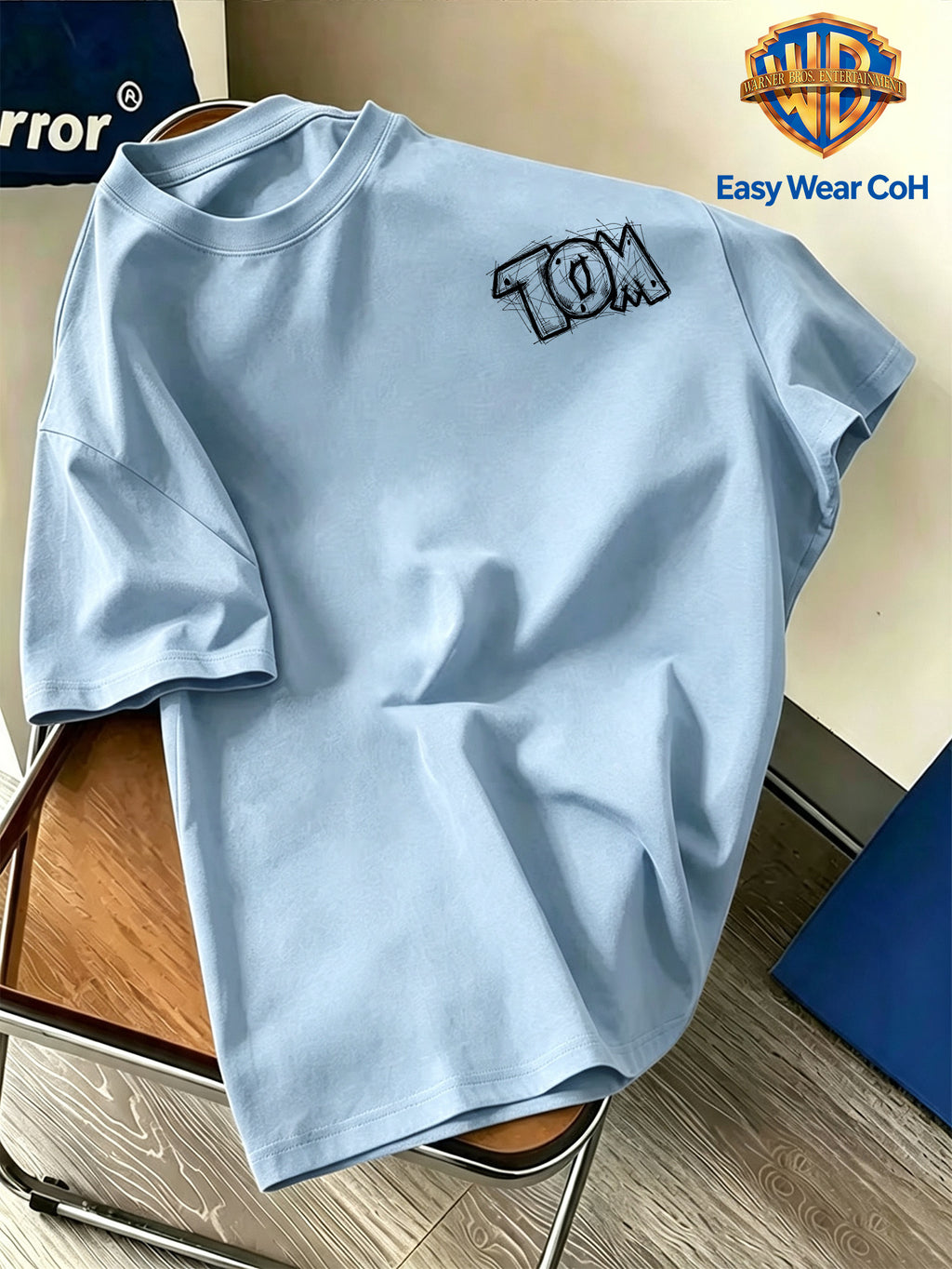 Warner Authorized New Preppy Style Men'S Short Sleeve T-Shirt, Hand-Drawn Sketch Style Cartoon Creative Niche Pattern Print, Chest with "TOM" Letter Sketch, Unique And Non-Mass-Produced, Comfortable Breathable Skin-Friendly Fabric - Light Blue