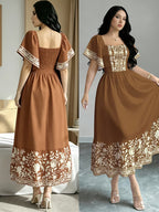 The Summer Floral-Themed Elegant Resort-Style Dress Features a Butterfly Wing Print Design, a Square Neckline And Short Sleeves, Is Equipped with a Waist-Cinching Design, And Has a Moderate Length - Khaki