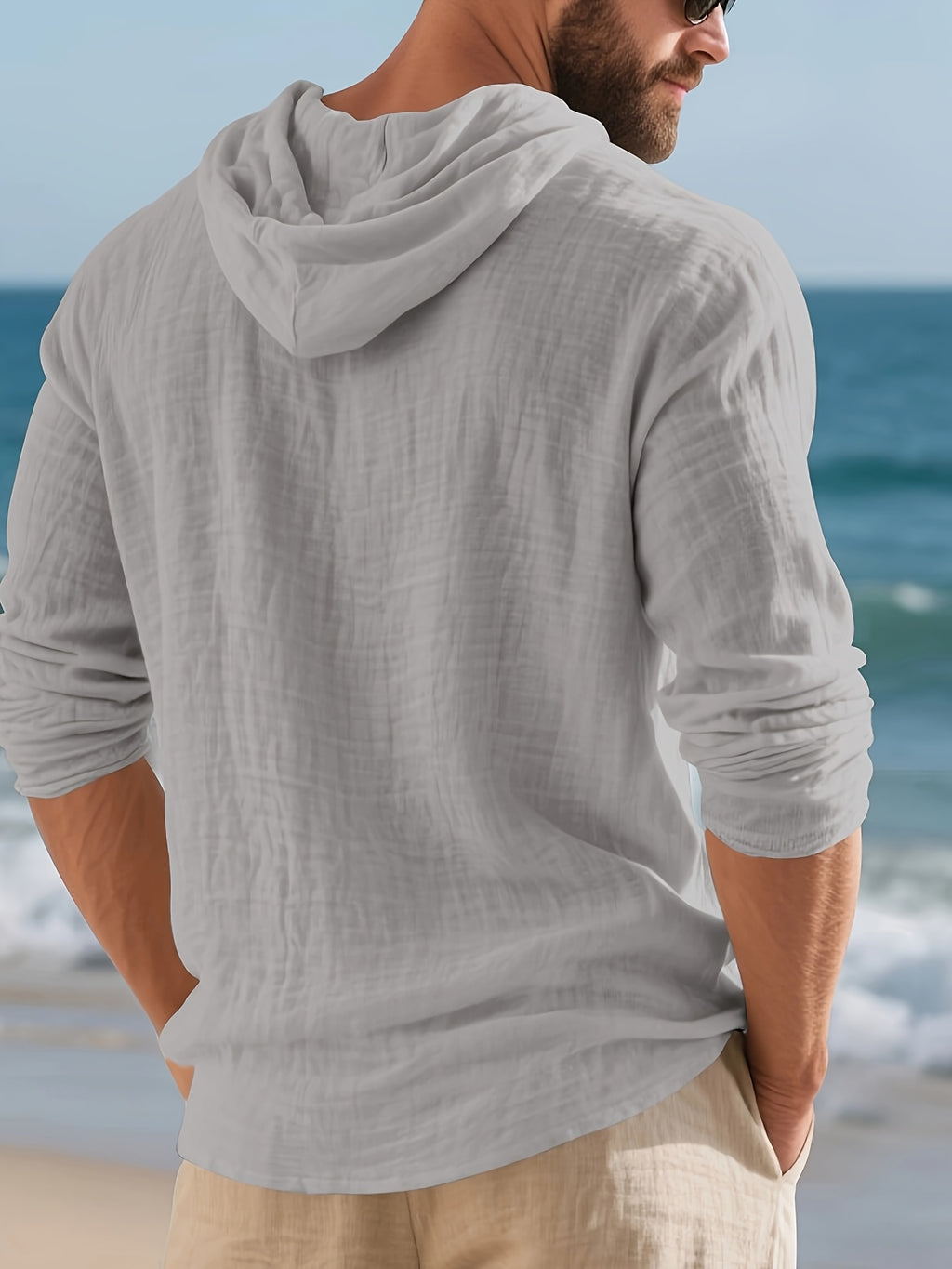 Men's Casual Linen Hoodie, Long Sleeve Henley Button Pullover. Crafted from Soft, Lightweight and Breathable Fabric, It Features a Relaxed Fit and Front Kangaroo Pocket. Ideal for Beach Vacations, Outdoor Activities, Travel and Daily Casual Wear. - Grey