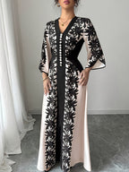 Plus Size, Elegant and Fashionable Plus-size Women's Printed Long-sleeve Dress, Adorned with Buckle Embellishments, Featuring a V-neck and Slit Cuffs. Suitable for Parties, Outings, Romantic Dates, and Daily Wear. Designed for Plus-size Women - Black