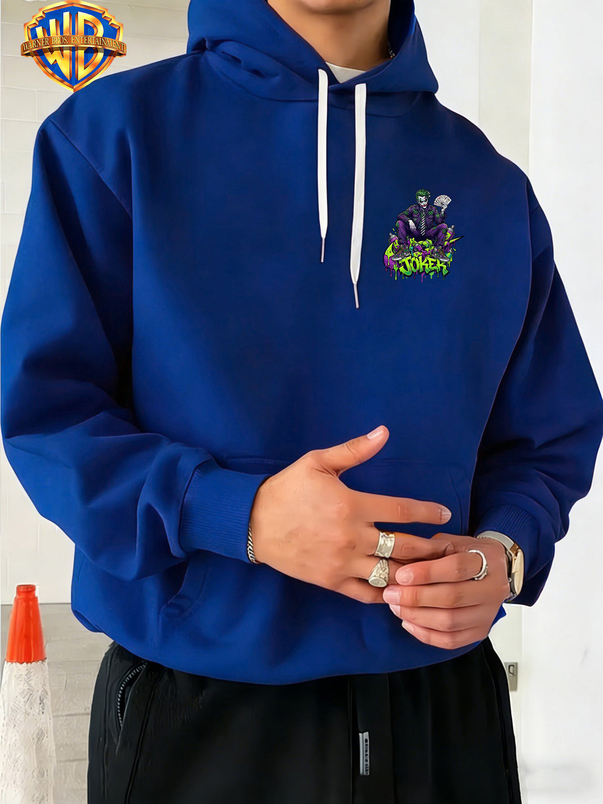 Warner Bros. JOKER Purple-Green Color Block Graffiti Art Font Spray-Painted Background Plaid Workwear Style Sneakers with Paint Drip Cool Print Men's Fashion Hooded Sweatshirt, Sleeve Print Design, Kangaroo Pocket, Drawstring Hood, Suitable for Daily - Blue