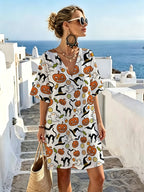 White V-neck Dress with Fun Halloween Patterns Featuring Pumpkins, Witch Hats, Black Cats, and Candy. The Refreshing Base Color Is Vibrant and Eye-catching, with Loose, Dropped-shoulder Short Sleeves for Comfort and Breathability - Mixed colors