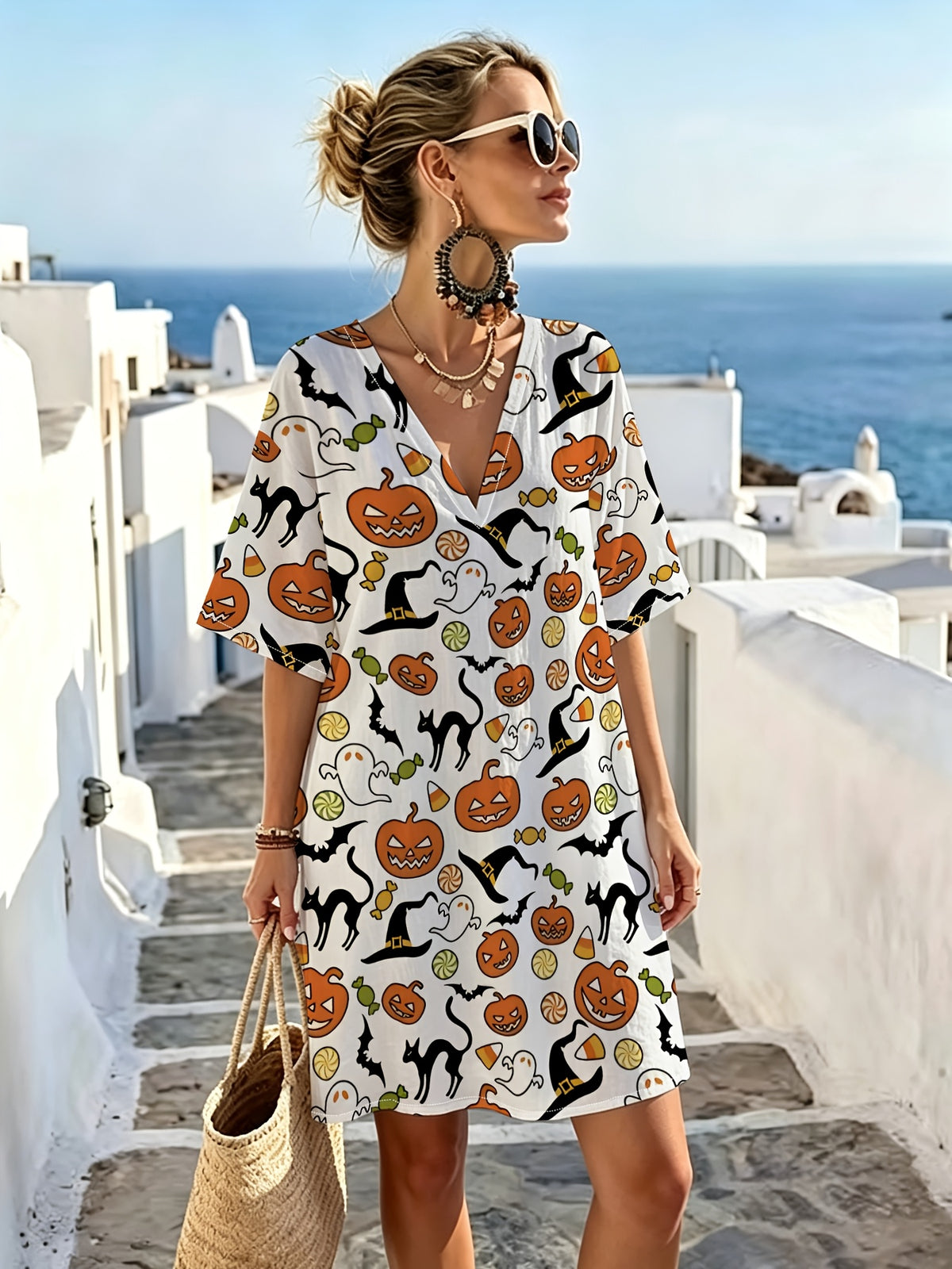 White V-neck Dress with Fun Halloween Patterns Featuring Pumpkins, Witch Hats, Black Cats, and Candy. The Refreshing Base Color Is Vibrant and Eye-catching, with Loose, Dropped-shoulder Short Sleeves for Comfort and Breathability - Mixed colors