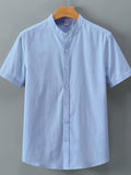 Single-piece Solid-colored Men's Short-sleeved Shirt, Classic Button-up Cardigan Style, Loose and Unrestricted, Available in Multiple Colors, Suitable for Office Wear, Casual Outings, and More. - Sky Blue