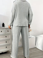 A Stylish And Casual Two-Piece Set for Women Featuring a Zip Collar Long-Sleeve Top And Wide-Leg Pants, Made from Soft, Skin-Friendly Fabric with a Vertical Stripe Texture, Perfect for Everyday Outings - Grey
