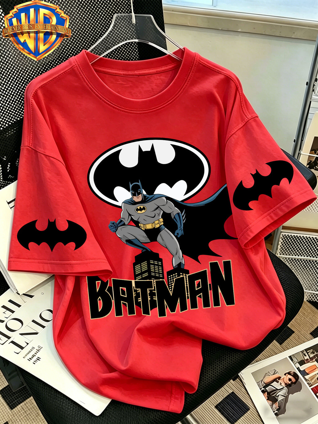 Official WB. Men's Short-sleeve T-shirt with Fun Cartoon Print Featuring the DC Batman Logo Character. Round-neck Top Suitable for Men's Casual Summer Daily Commutes, Home Wear, and Office Outfits - Red