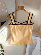 New Spring Summer Style, Elegant French Style Sleeveless White Vest, Fashionable And Graceful, Featuring High-End Decorative Buttons And a Unique Black And White Block Design - ginger-colored