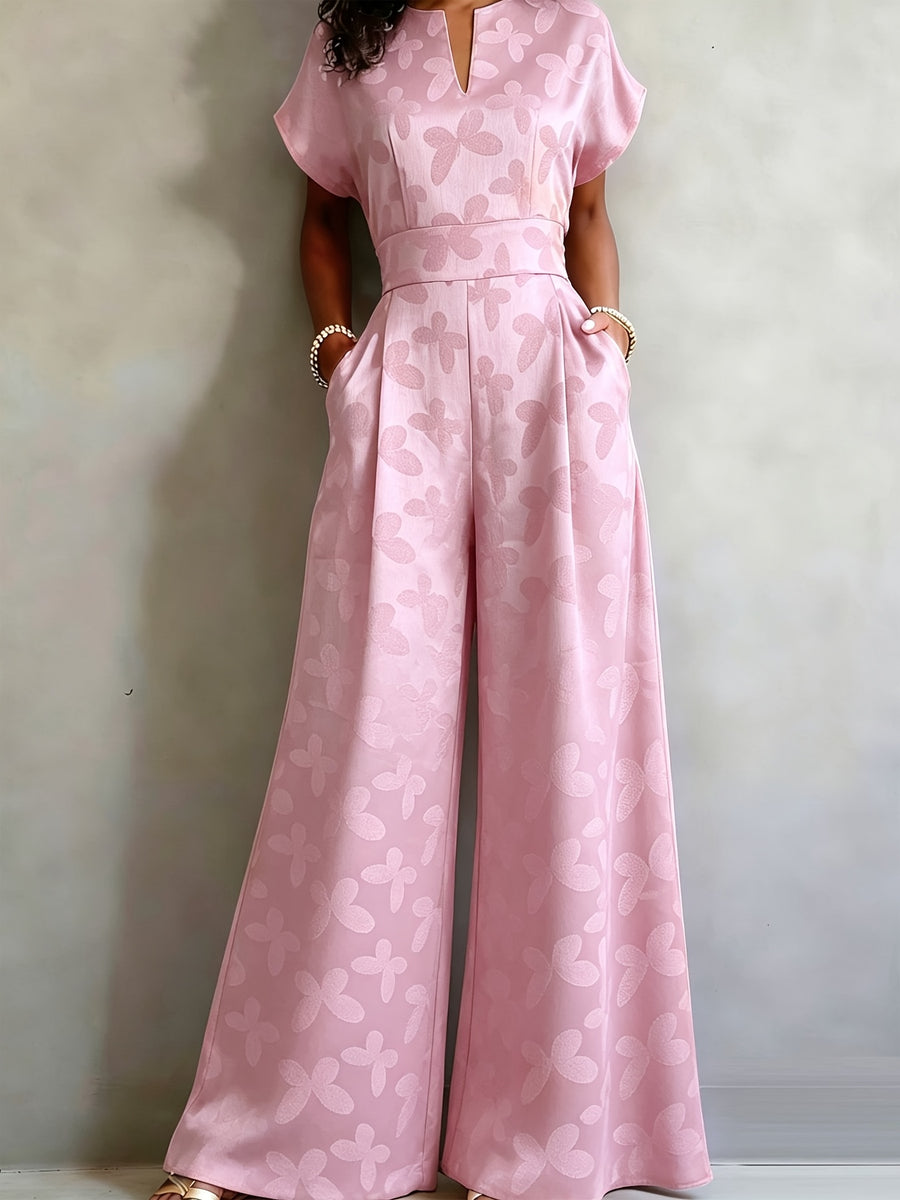 New Spring/Summer 2026 Women's Jacquard Short-Sleeve Jumpsuit with Subtle Butterfly Pattern, V-Neck, Cinched Waist, and Wide-Leg Pants. This Light Luxury, High-end Jumpsuit Offers a Sophisticated Look for Commuting. The Simple and Exquisite V-neck - Pink Color