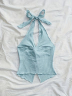 Fashionable And Sexy Sleeveless Top with a Tie, Twisted Hem, Side Slits, And an Open Back - Light Blue