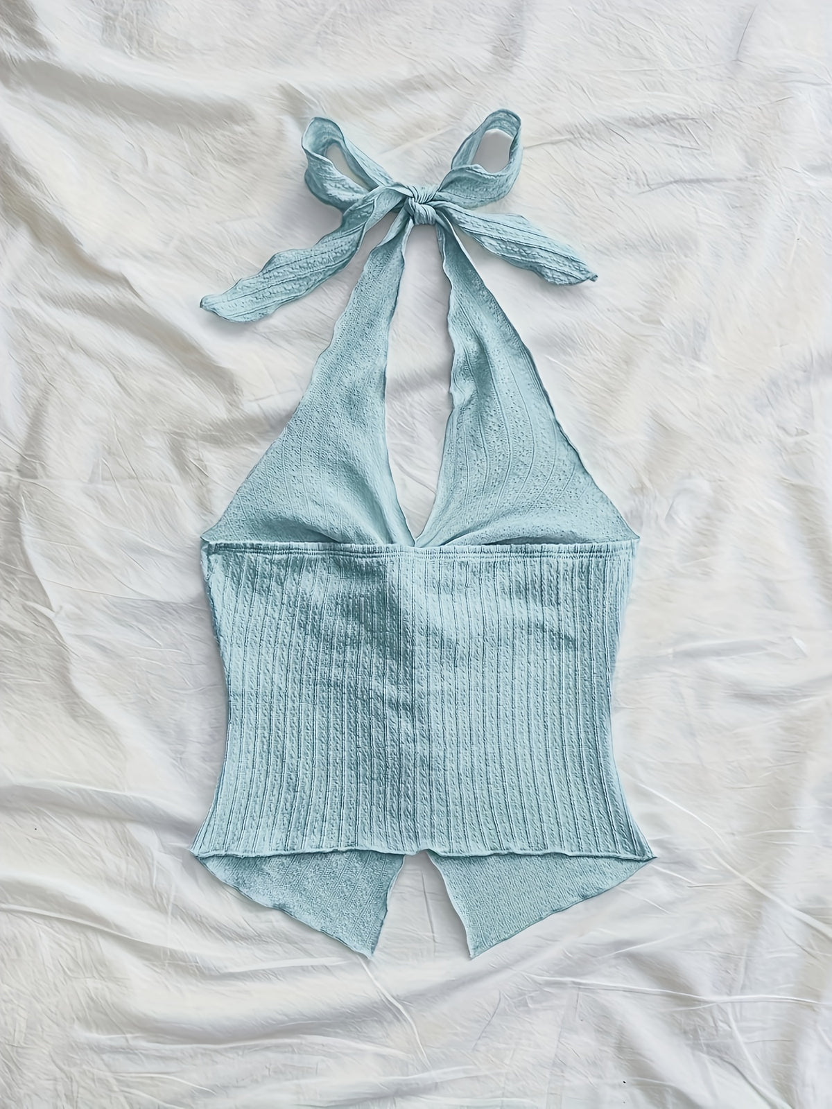 Fashionable And Sexy Sleeveless Top with a Tie, Twisted Hem, Side Slits, And an Open Back - Light Blue