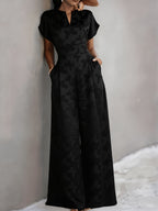 New Spring/Summer 2026 Women's Jacquard Short-Sleeve Jumpsuit with Subtle Butterfly Pattern, V-Neck, Cinched Waist, and Wide-Leg Pants. This Light Luxury, High-end Jumpsuit Offers a Sophisticated Look for Commuting. The Simple and Exquisite V-neck - Black
