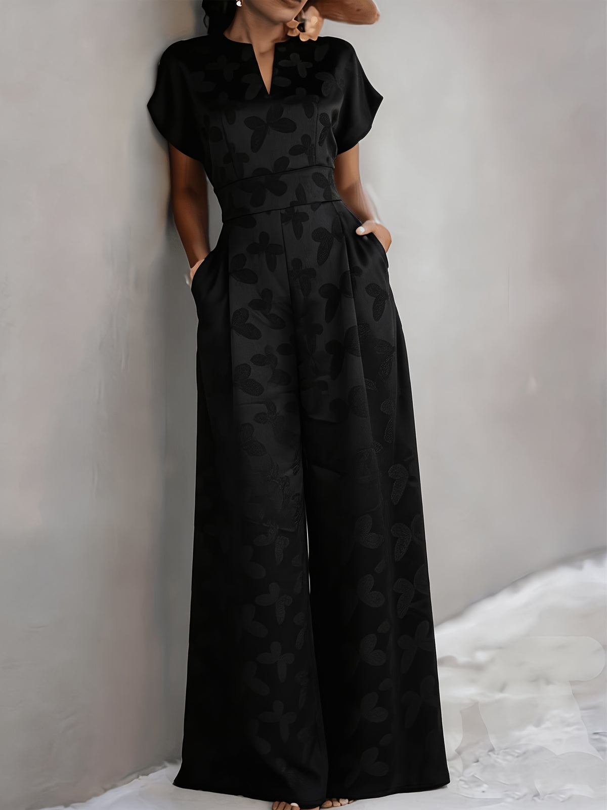 New Spring/Summer 2026 Women's Jacquard Short-Sleeve Jumpsuit with Subtle Butterfly Pattern, V-Neck, Cinched Waist, and Wide-Leg Pants. This Light Luxury, High-end Jumpsuit Offers a Sophisticated Look for Commuting. The Simple and Exquisite V-neck - Black