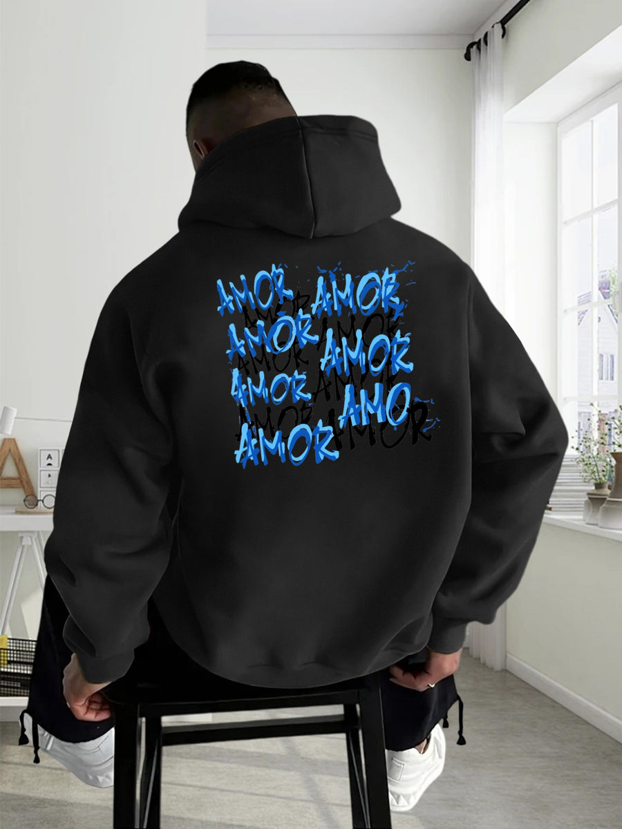 Thanksgiving Men's Hoodie with "AMOR" Blue Ink Splatter Graffiti Print on the Back, Warm and Comfortable Autumn/Winter Hooded Sweatshirt, Featuring a Practical Kangaroo Pocket, Trendy Brand-Style Stacked Letter Pattern and Floral Design - Black