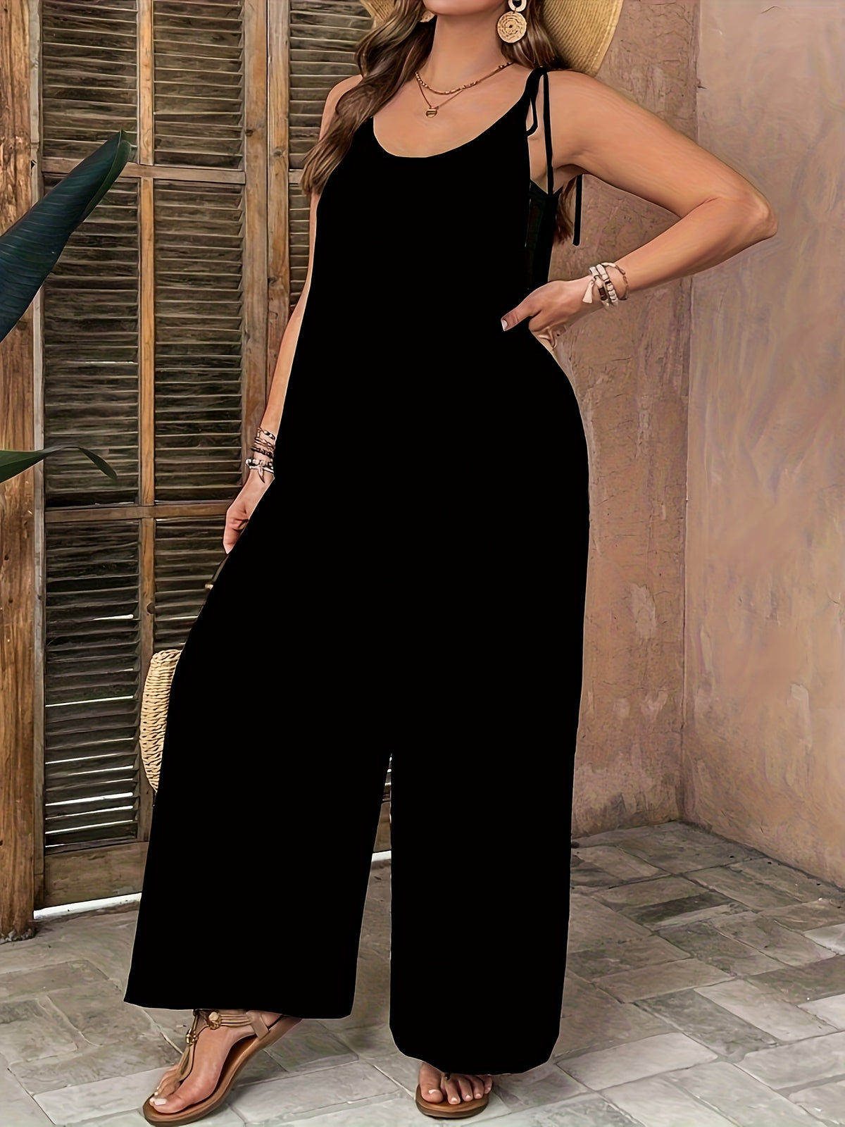An Elegant Casual Dress, a Spring And Summer Style Sleeveless Jumpsuit for Women in European And American Fashion, Featuring Pockets And Adjustable Straps - Black