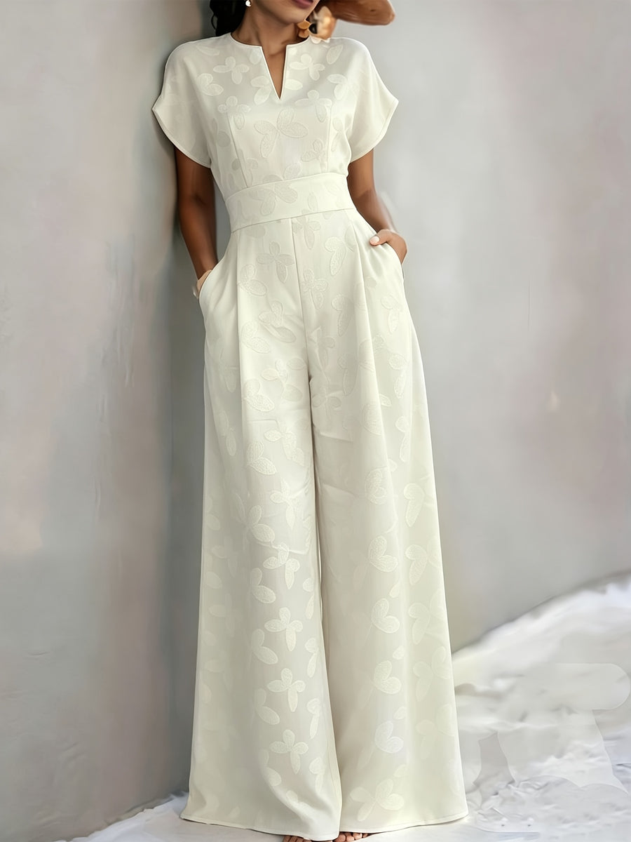 New Spring/Summer 2026 Women's Jacquard Short-Sleeve Jumpsuit with Subtle Butterfly Pattern, V-Neck, Cinched Waist, and Wide-Leg Pants. This Light Luxury, High-end Jumpsuit Offers a Sophisticated Look for Commuting. The Simple and Exquisite V-neck - Off-white