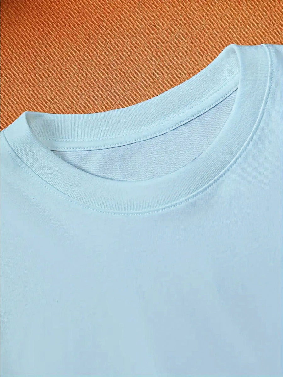 Official Warner Bros. T-shirt Featuring a Print of a Classic Character Laughing While Holding a Cherry; Men's 100%, Comfortable, Versatile, and Loose-fitting Short-sleeve Summer Tee-suitable for Outdoor Activities and Casual Attire. - Blue