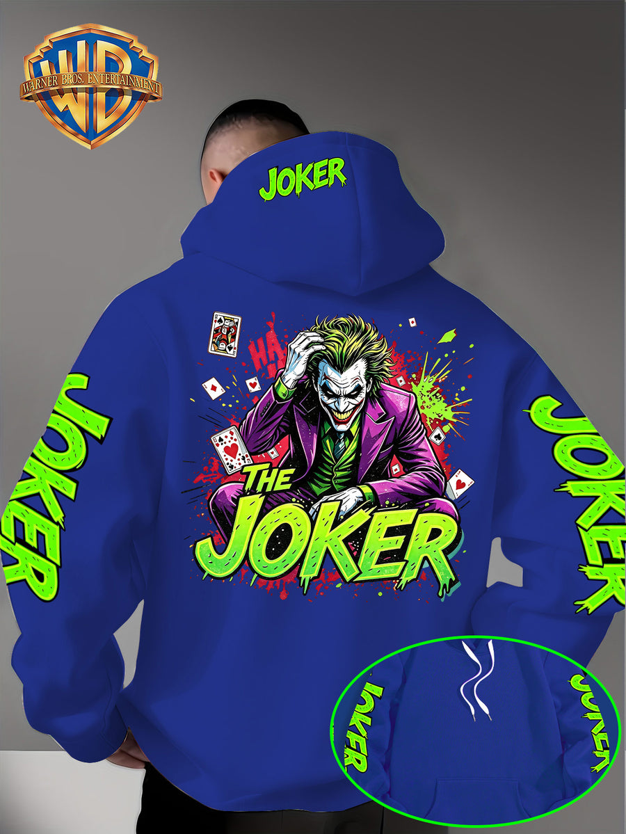 Official Warner Bros. Joker Comic-style Print Featuring Red and Green Ink-splatter Effects and "THE JOKER" Lettering. The Sleeves and Back of the Hood Are Adorned with Green "JOKER" Lettering. This Men's Trendy Printed Hooded Sweatshirt Features - Blue