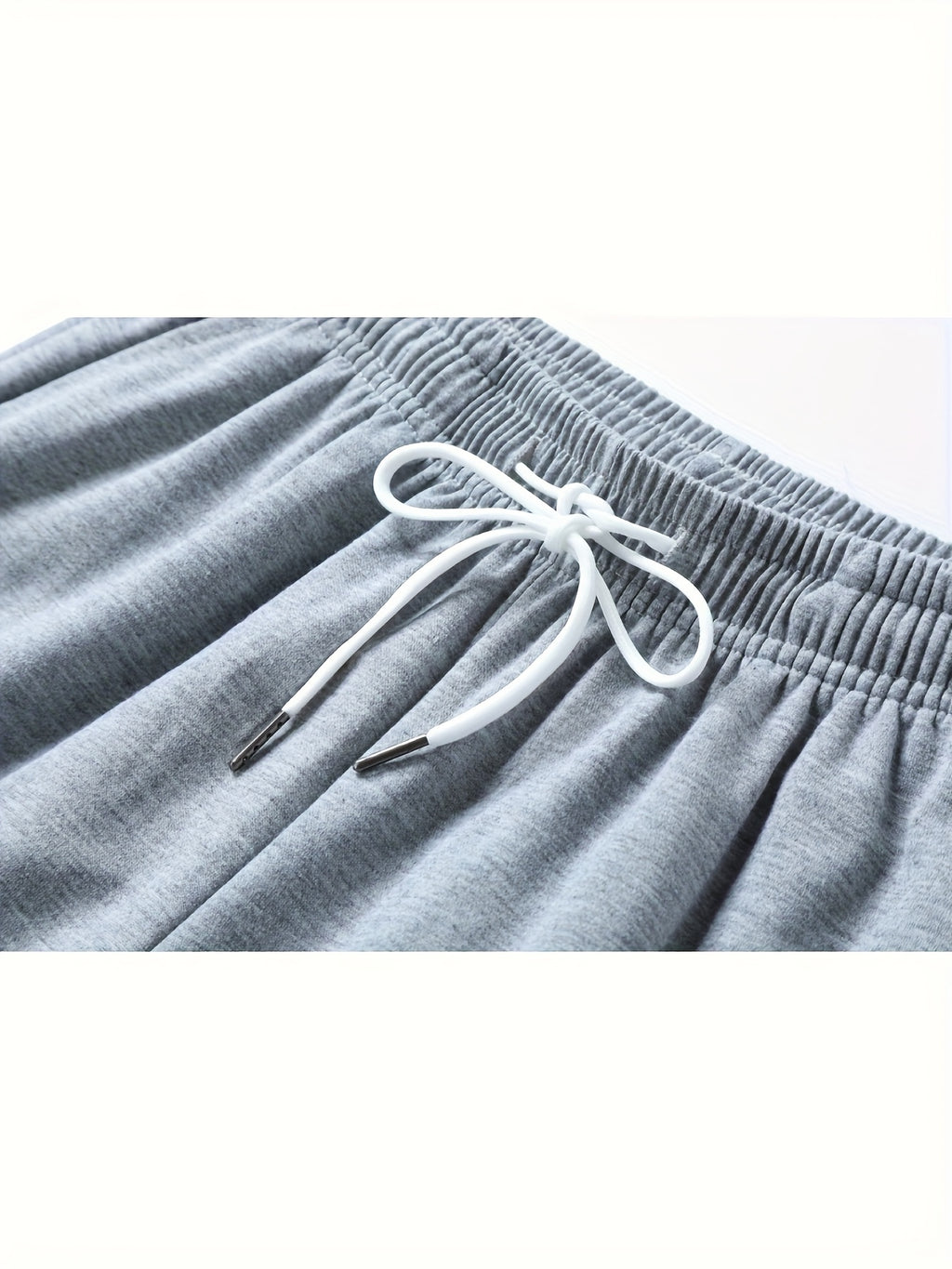 A Pair of Summer Women'S Long Pants, Casual Trousers for Women, Made of And, Featuring Elastic Fabric with Tapered Legs, an Elastic Drawstring at The Waist, Side Pockets, Suitable for Outdoor, Camping, Wear, And Women'S Pants. - Grey