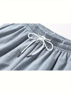 A Pair of Summer Women'S Long Pants, Casual Trousers for Women, Made of And, Featuring Elastic Fabric with Tapered Legs, an Elastic Drawstring at The Waist, Side Pockets, Suitable for Outdoor, Camping, Wear, And Women'S Pants. - Grey