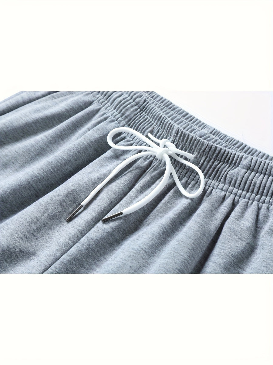 A Pair of Summer Women'S Long Pants, Casual Trousers for Women, Made of And, Featuring Elastic Fabric with Tapered Legs, an Elastic Drawstring at The Waist, Side Pockets, Suitable for Outdoor, Camping, Wear, And Women'S Pants. - Grey