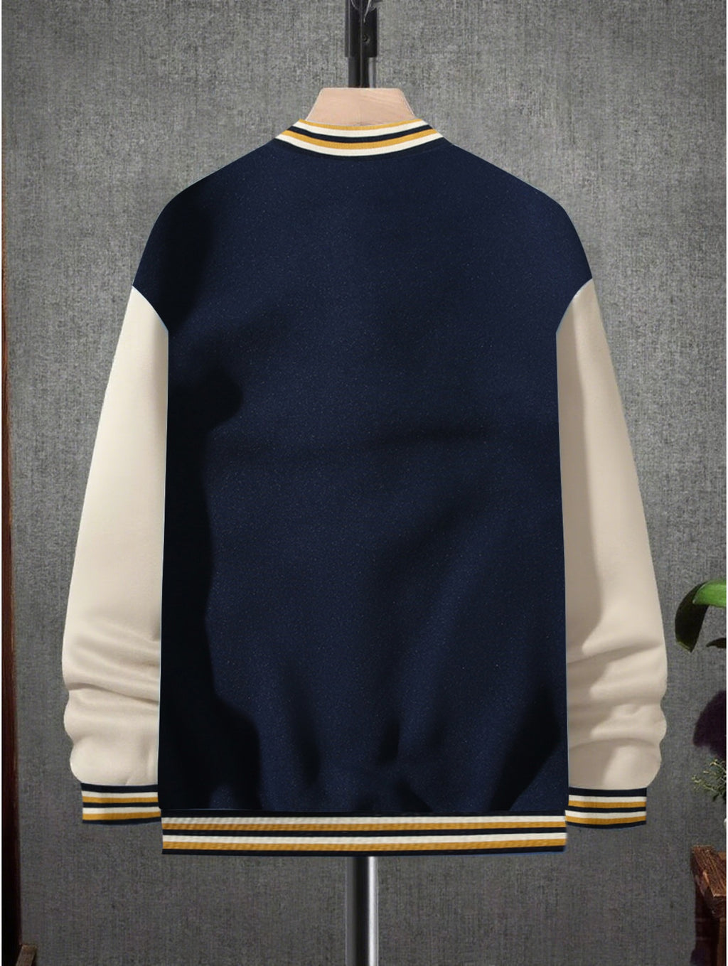 This Black And Gray Patchwork Baseball Jacket Features a Button Closure Design, with Black And White Striped Accents at The Collar And Cuffs. It Showcases Prominent Letter Prints And English Text Elements on The Chest - Tibetan White