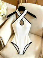 Elegant and Exquisite Women's Cross-Back Halter Ribbed Bodysuit, a Fashionable, Sexy,, and Figure-Flattering Piece Suitable for Parties, Nightclubs, Dates, Vacations, and Beach Outfits - White