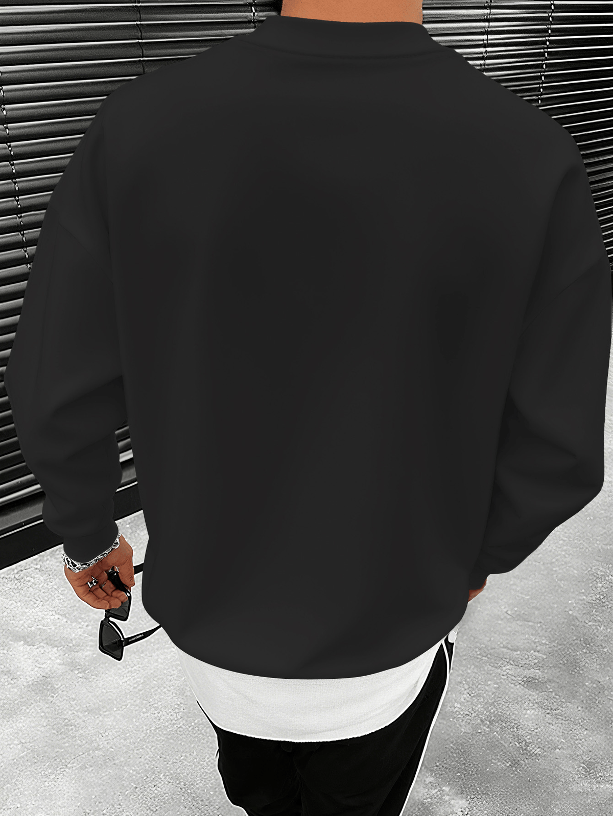 A Men's Crewneck Sweatshirt with a Streetwear-style Creative Patch Featuring a Small Bear Print - Black