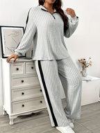 A Stylish And Casual Two-Piece Set for Women Featuring a Zip Collar Long-Sleeve Top And Wide-Leg Pants, Made from Soft, Skin-Friendly Fabric with a Vertical Stripe Texture, Perfect for Everyday Outings - Grey