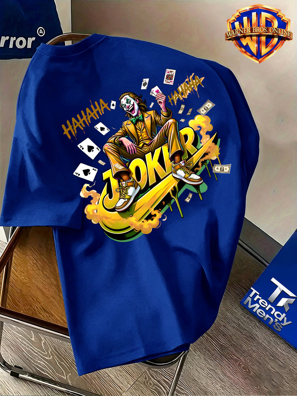 Warner Bros. Official Men's 100% Short-Sleeve T-Shirt, American Cool Vibe with Villain Illustration. Features a Simple Logo on the Chest and a Dynamic Joker Character Depiction on the Back, Incorporating American Streetwear Elements with Bold - Royal Blue