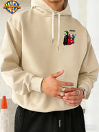 Warner Bros. American Comic-style Joker and Harley Quinn Back-to-back Design, JOKER Title Character with Heart Graphic and Colorful Triangle Accents, Trendy and Cool Printed Men's Fashion Hooded Sweatshirt, Sleeve Print Design, Kangaroo Pocket - Apricot