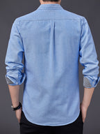 Men's Oxford Cloth Long-Sleeve Shirt for Spring/Autumn, with Lapel Collar, Simple Pocket, and English Print Decoration. Features Contrast Color Cuffs and Collar Design. A Versatile Basic Shirt for Business Casual Wear, Available in Multiple Colors - Light Blue
