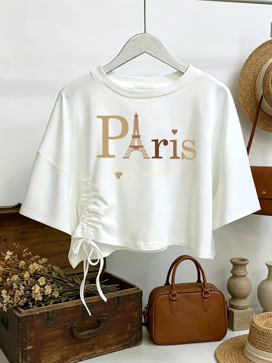 Women's French Paris T-Shirt with Eiffel Tower & Gradient Lettering - Loose-Fit Short Sleeve Top, Drawstring Hem & Exposed Waist Design, Soft Machine-Washable Blouse Suitable for Travel, Beach, Vacation, Casual French Outfits - White