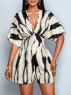 Women's Elegant and Fashionable Floral Pattern Jumpsuit with a Deep V-neck and Batwing Sleeves, Featuring a Pleated Waist, Perfect for Spring/summer. Suitable for Commuting, Casual Wear, Dates, Sexy Looks, Romance, Vacations, and Parties. - Milky