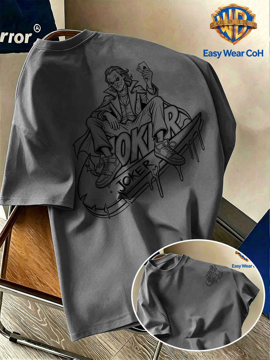 Warner Bros. Official New Academic Style Men's Short-Sleeve T-Shirt, Featuring a Unique Graffiti-style Line Sketch Drip-paint Design with a Long, Flowing Graphic and a Creative Niche JOKER Clown Print. The Distinctive Design Is Hard to Replicate - Dark Gray