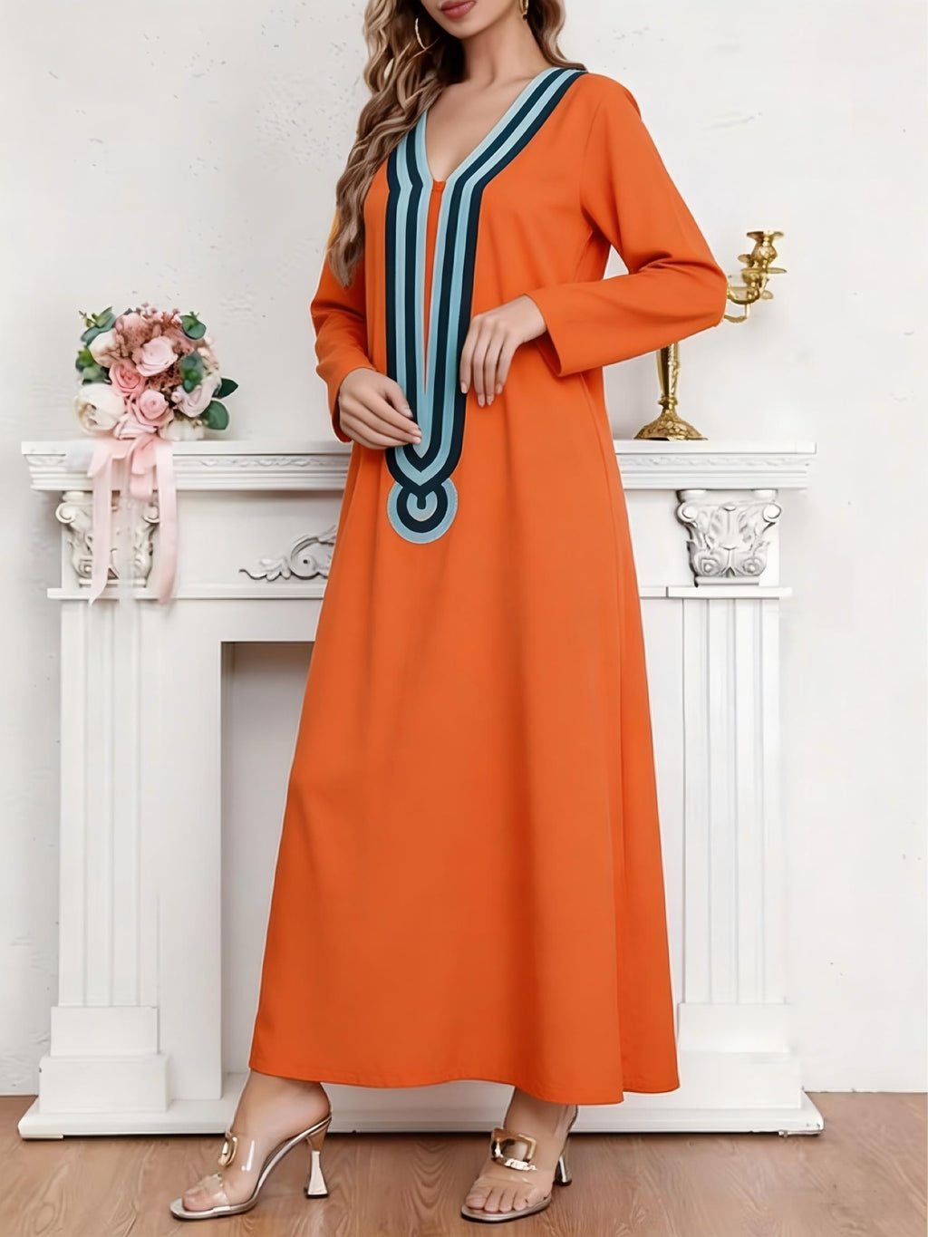 New Orange Long-Sleeve Kaftan Abaya, Featuring a Simple V-neck Design, a Smooth and Loose Fit, and Soft, The Long Length Conceals and Slims the Figure, Suitable for Both Daily Outings and Gatherings. This Vintage Exotic-style - Orange