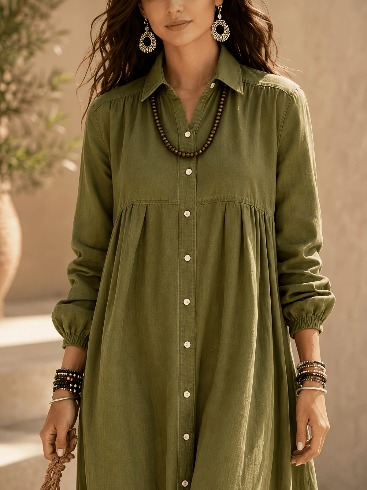 Notched Lapel Full-front Button- Lantern-sleeve Dress with Waist Gathers, Loose Fit, Full Flared Skirt, Side Pockets, Front Slit, and a Shirting-style Overlay. Features Adjustable Elasticized Notched Lapel, Long Gathered Sleeves, a Long Length - Olive Green