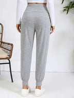An Elegant Women's Casual High-waisted Pants with Slant Pockets. Women's Pants and Cuffed Long Pants for Spring, Summer, and Autumn - Light Grey