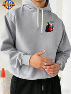 Warner Bros. American Comic-style Joker and Harley Quinn Back-to-back Design, JOKER Title Character with Heart Graphic and Colorful Triangle Accents, Trendy and Cool Printed Men's Fashion Hooded Sweatshirt, Sleeve Print Design, Kangaroo Pocket - Light Grey