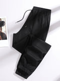 A Pair of Summer Women'S Long Pants, Casual Trousers for Women, Made of And, Featuring Elastic Fabric with Tapered Legs, an Elastic Drawstring at The Waist, Side Pockets, Suitable for Outdoor, Camping, Wear, And Women'S Pants. - Black