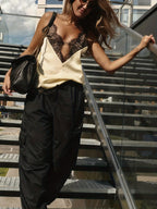 Versatile and Elegant Lace Petal Trimmed Hollow-out V-neck Spaghetti Strap Loose-fit Tank Top - Apricot