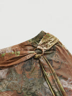 Hippie-style Women's Vintage Bohemian Asymmetrical Hem Paisley Print A-line Skirt, Spring/Summer Collection, High-Waist Ruffled Asymmetrical Hem Midi Skirt, Tie-Waist Wrap Skirt, Asymmetrical Hem Skirt - Brown